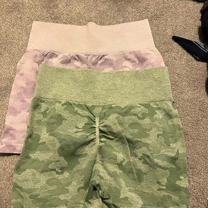 Two work out shorts green and purple